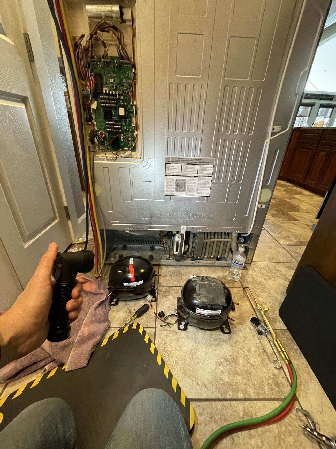 LG linear compressor replacement — Adam & Sam Brothers Repair