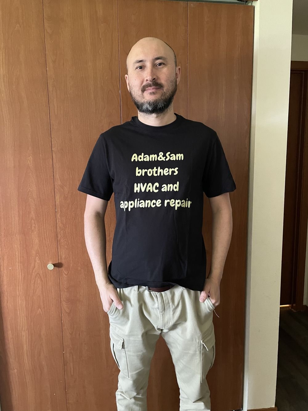 Sam in Adam & Sam Brothers Repair uniform — HVAC and appliance repair